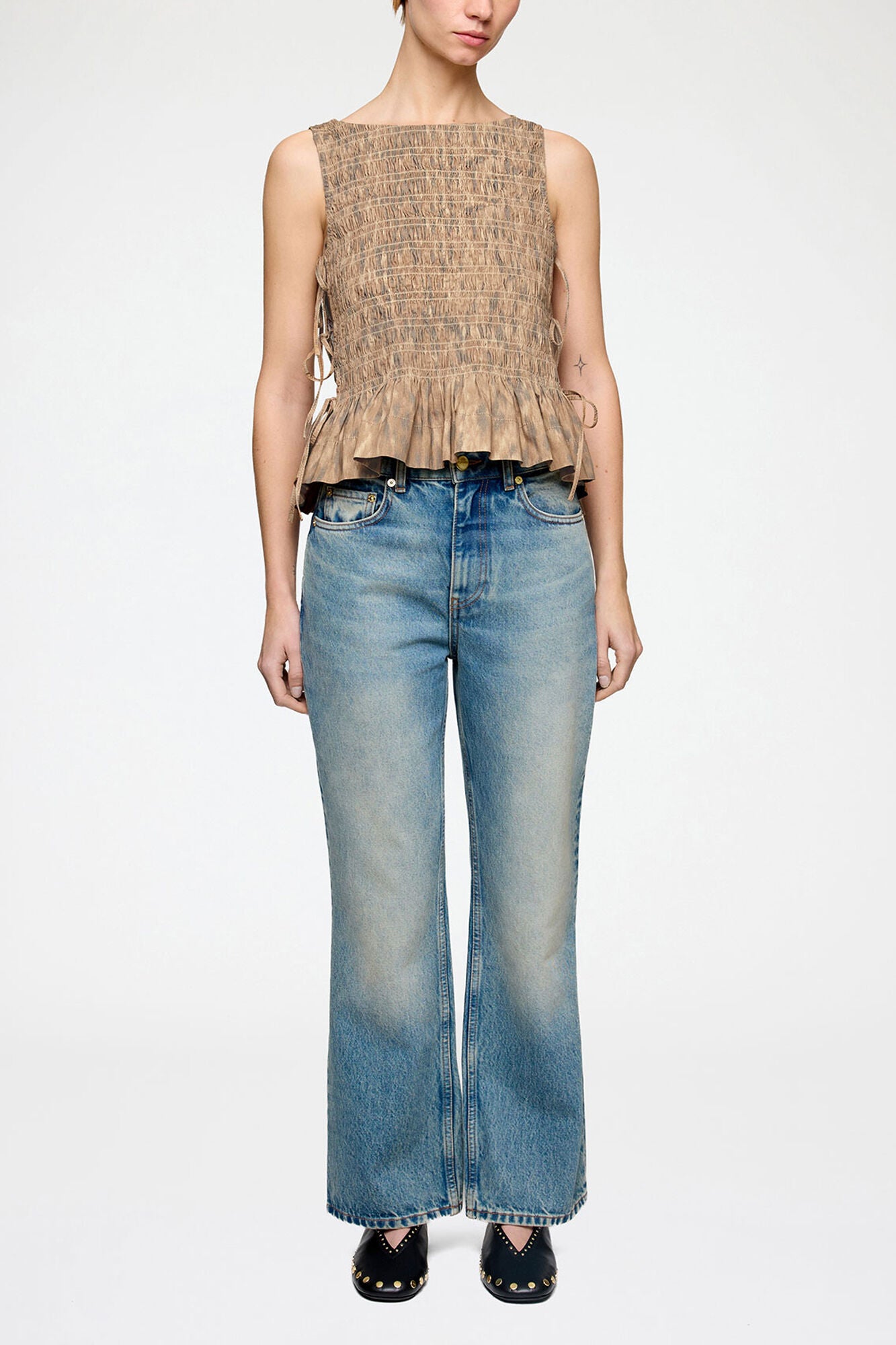 Ganni Printed stretch smocked top